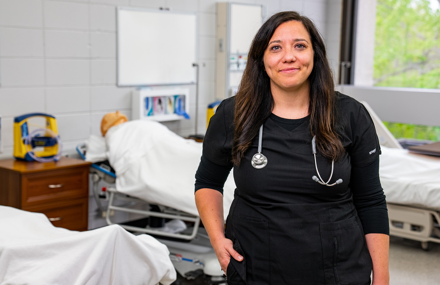 Female nurse smiles