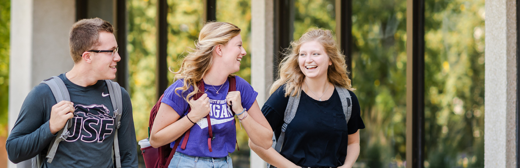 three students walking