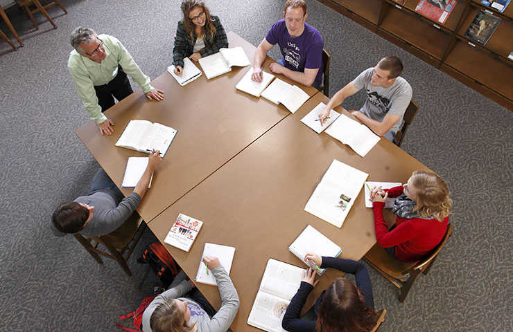 Professor Mike Grevlos teaching a class in USF's library. 